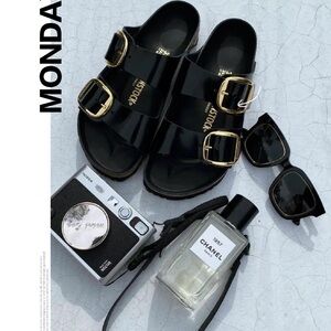 Birkenstock Black Sandals with Gold Buckles